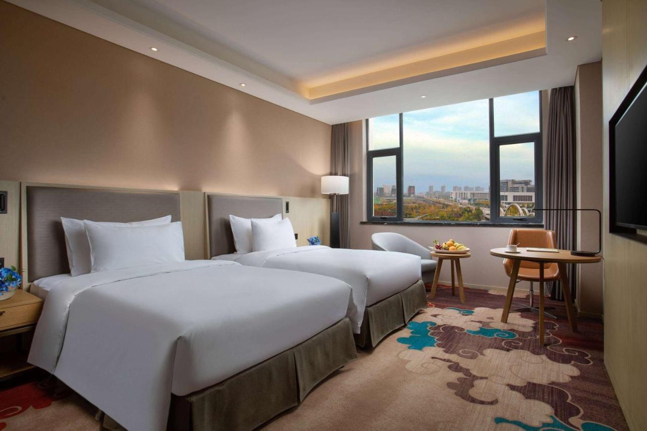 Hotel Ramada Wyndham Zhengzhou Xinzheng Xinzheng  Exterior foto