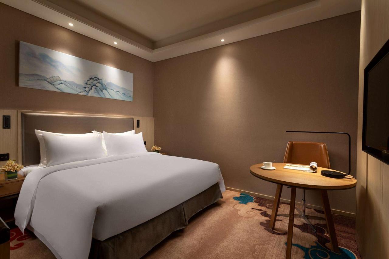 Hotel Ramada Wyndham Zhengzhou Xinzheng Xinzheng  Exterior foto